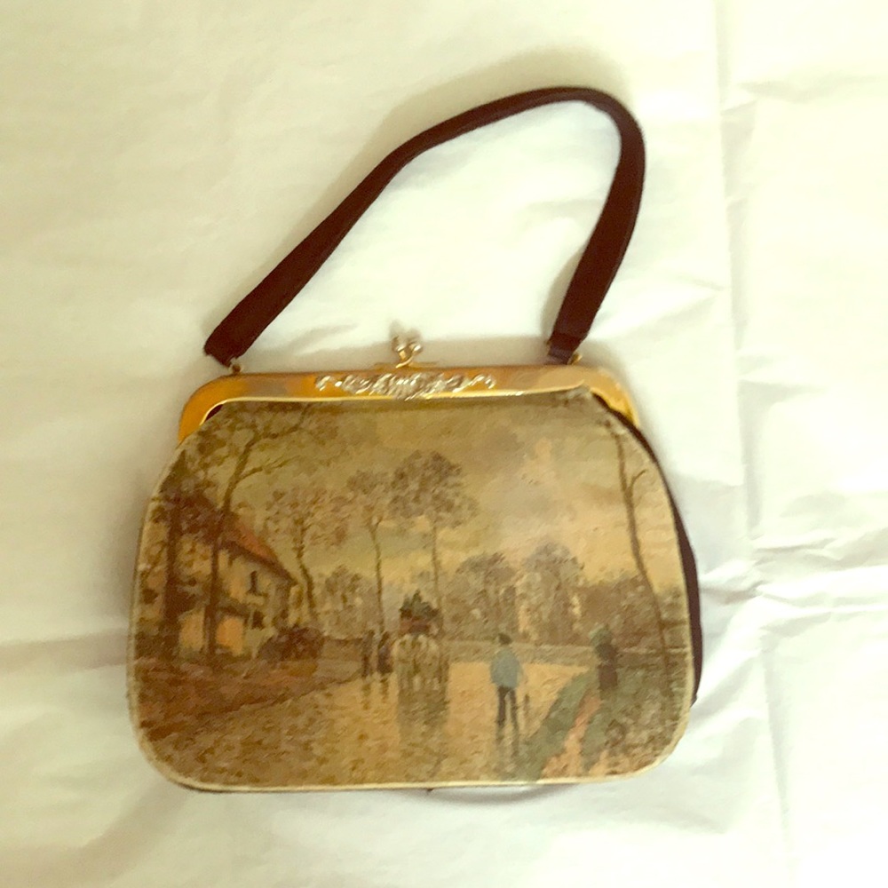 Vintage handbag with coordinating wallet.